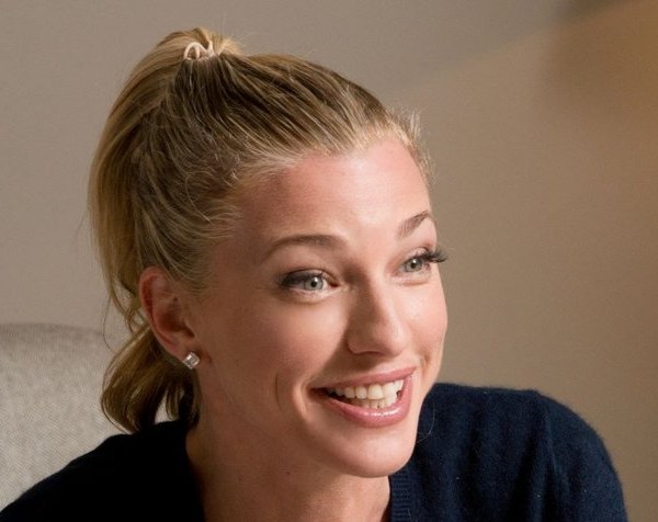 Nicole Junkerman smiling warmly in a sunlit room